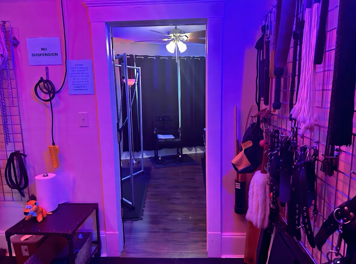 Toy wall and entry to dark play room