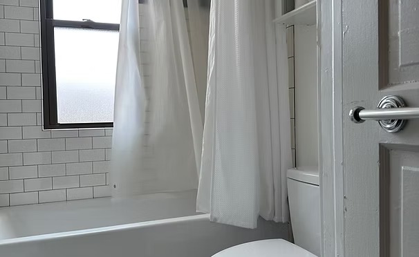Bathroom with subway tile and soaking tub